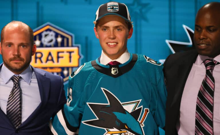 Will Smith tried on a San Jose Sharks sweater after being selected fourth overall. (Bruce Bennett/Getty Images)