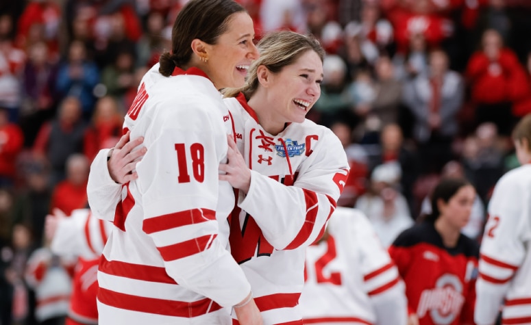 Casey O'Brien (Milton, Mass.), right, celebrates Wisconsin's title with Marianne Picard. (Bailey Hillesheim/Getty Images)