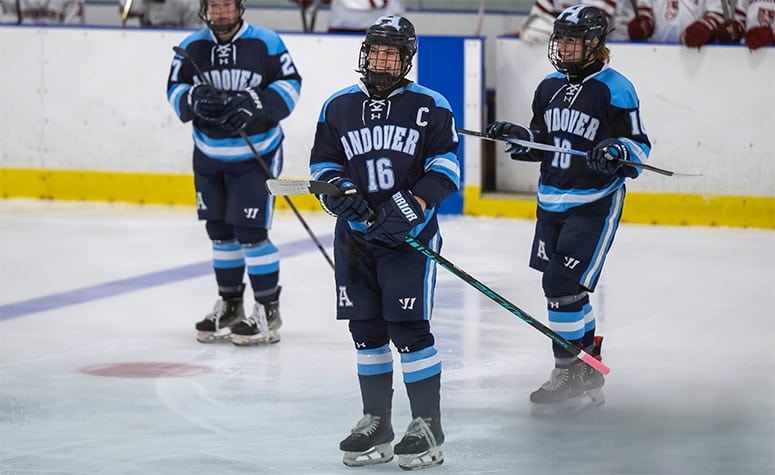 Phillips Andover's Caroline Averill (middle) celebrates her first goal against Governor's. (Patrick Donnelly/NEHJ)