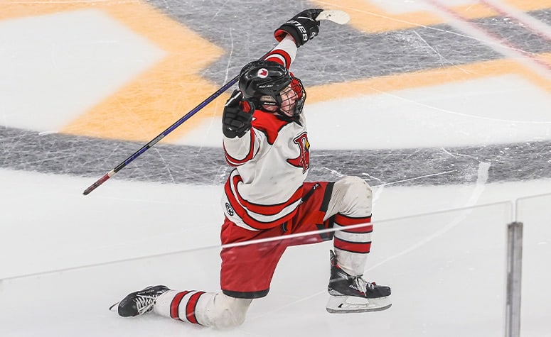 Luke Latulippe celebrates his winning goal on Sunday. (Brian Kelly/NEHJ)