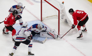 Team USA upends Canada, soars to world juniors gold as locals star