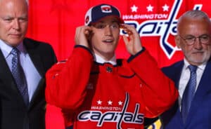 Ryan Leonard donned a Washington Capitals sweater at the NHL Draft on Thursday. (Bruce Bennett/Getty Images)
